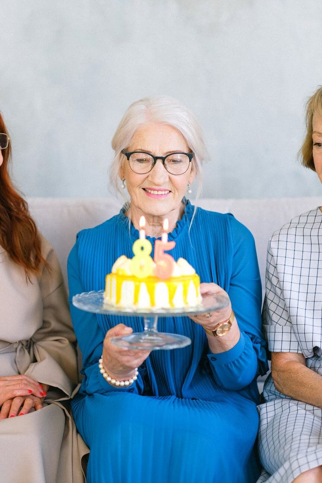 Elderly client with her birthday cake