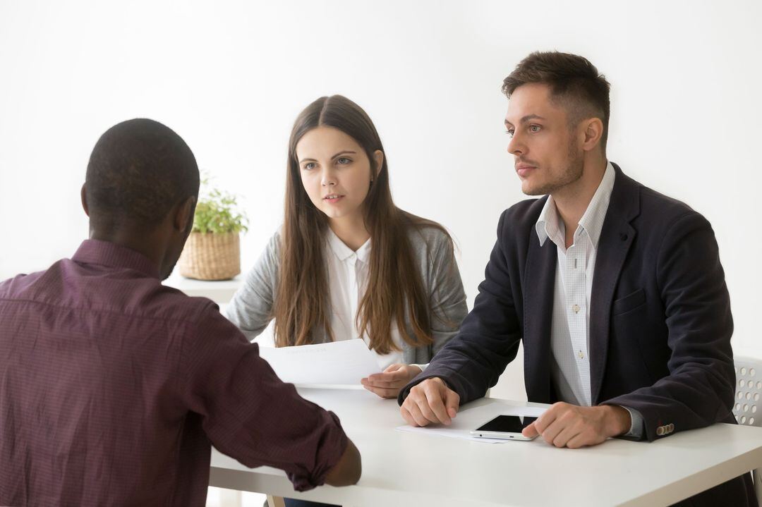 Job interview between a client and an employer